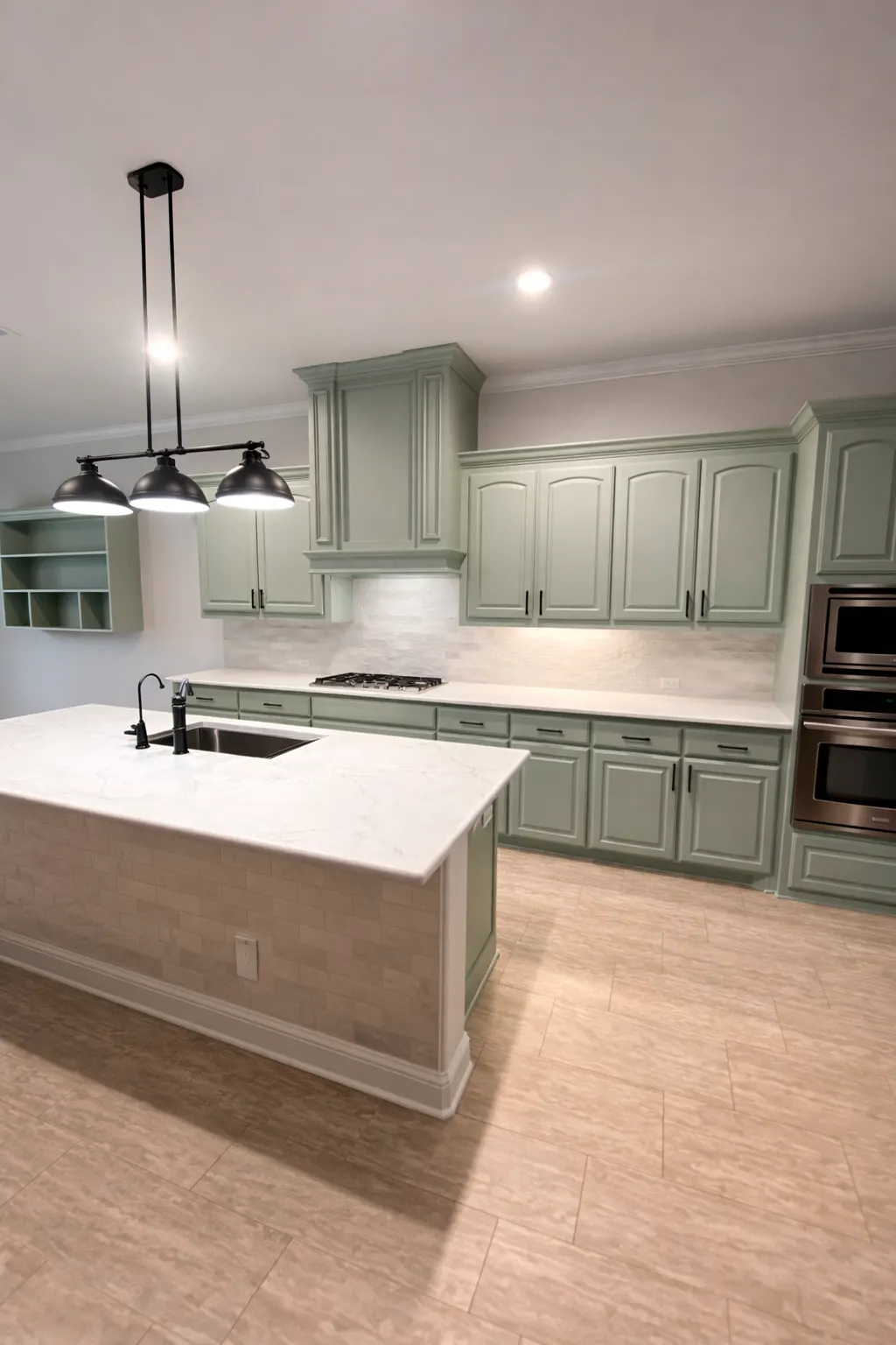 Modern Fort Worth kitchen remodel with custom sage green cabinets and island